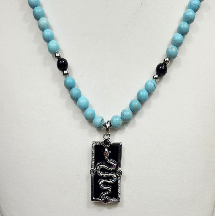 Silver Enamel Snake Dog Tag pendant on a Turquoise necklace