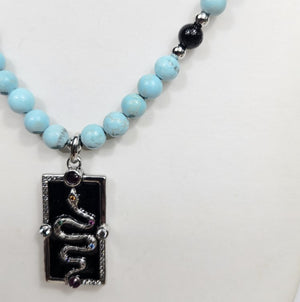 Silver Enamel Snake Dog Tag pendant on a Turquoise necklace